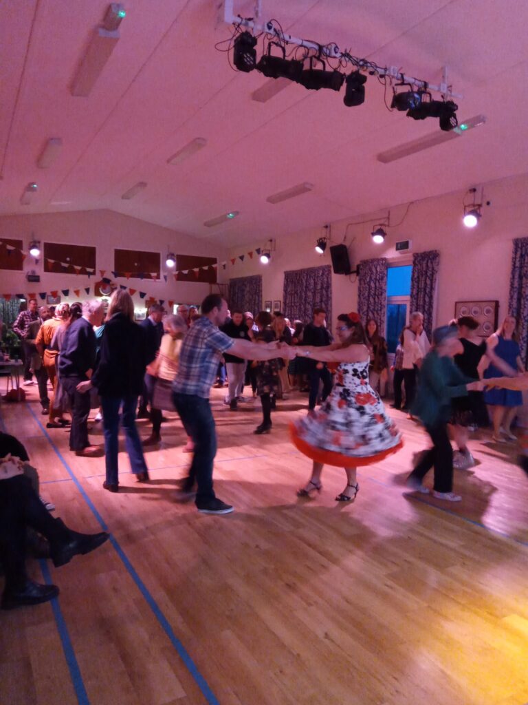 People dancing to a live band